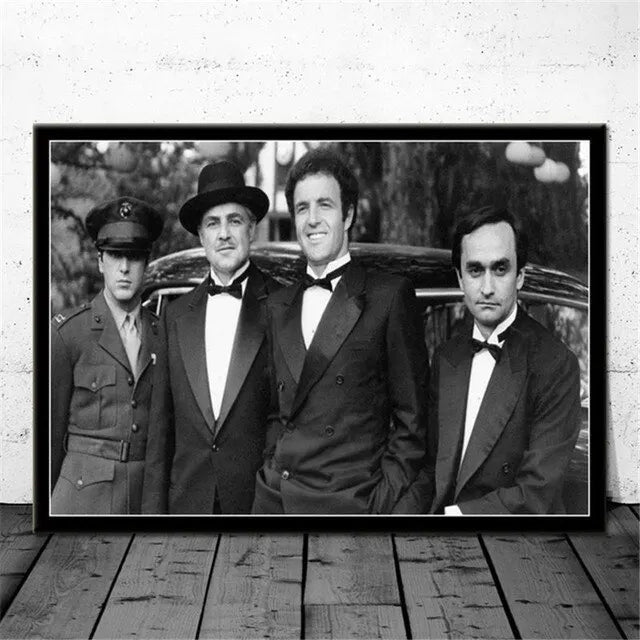 Black and white photo of three men dressed in suits posing for a movie poster