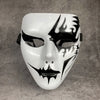 A white masquerade mask with black, stylized tribal or Hanfu-inspired markings.