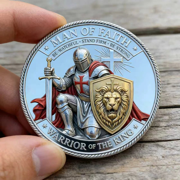 A silver coin featuring a 3D carved lion design and text related to the warrior of the king.