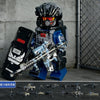 A SWAT-themed building block miniature figure wearing tactical gear and holding a rifle, displayed against a gray background.