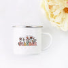 A white enamel mug with a floral design and the word TEACHER printed on it, set against a white background.