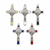 A set of five silver crucifix pendants with enamel finishes, including a large cross and smaller versions.