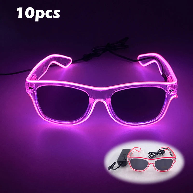 Pair of pink LED wire party glasses with a black cord shown against a purple background.