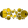 Abstract design of various sized gold and yellow circular mirror decals arranged in a scattered pattern
