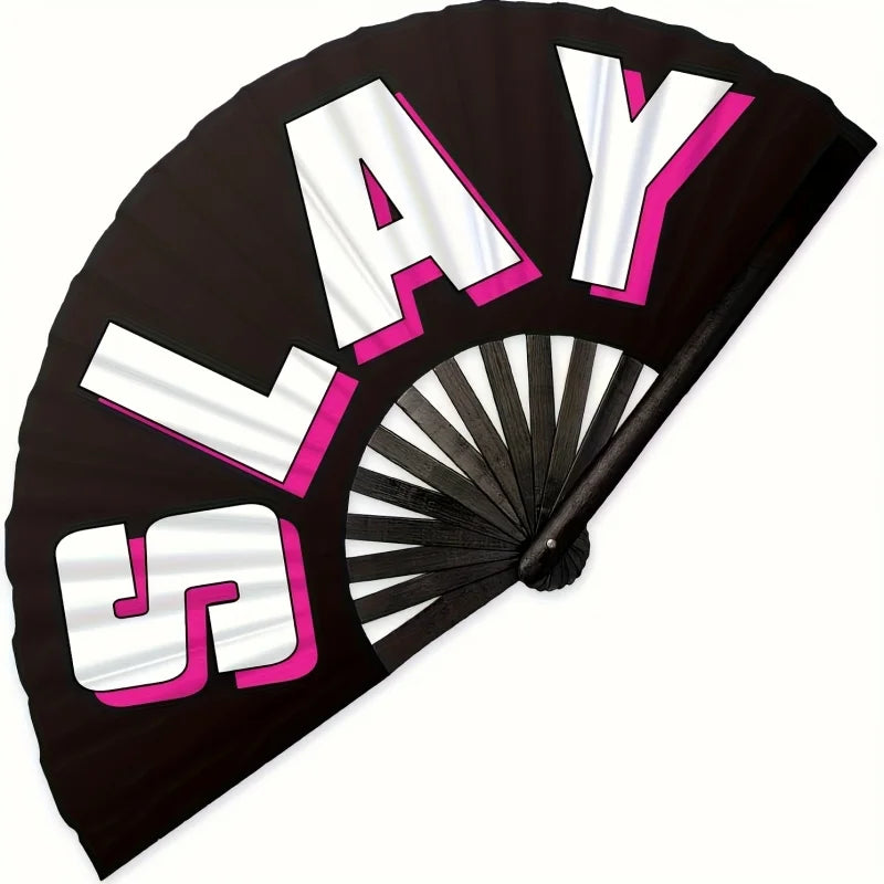 A black hand fan with the word SLAY written in large white and pink letters.