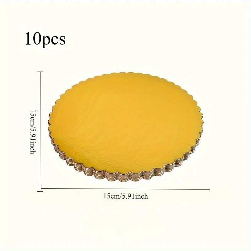 A set of ten round yellow disposable cake plates with a scalloped edge.
