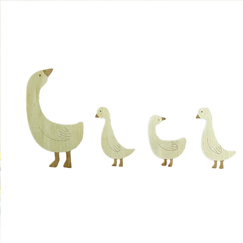 Handcrafted wooden goose wall art featuring several stylized geese in light natural wood tones.