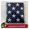 Black fabric embroidered with white stars resembling an American flag, packaged as a valued gift for patriots.