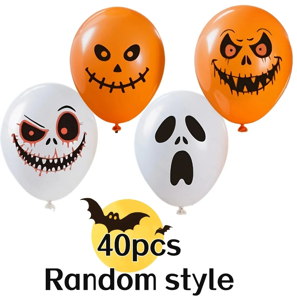 A collection of orange and white latex balloons featuring various spooky, Halloween-themed face prints.