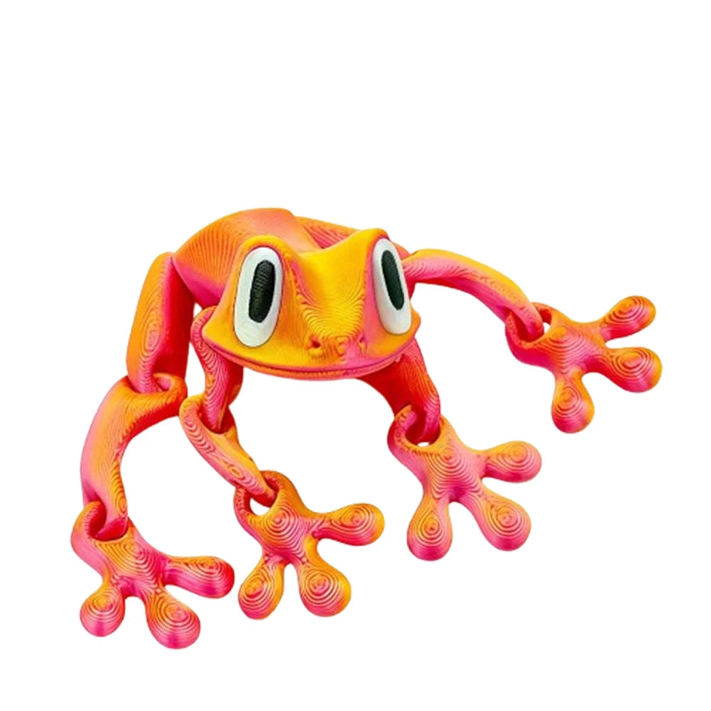 A realistic, orange frog figurine with pink accents, used as a fridge magnet.