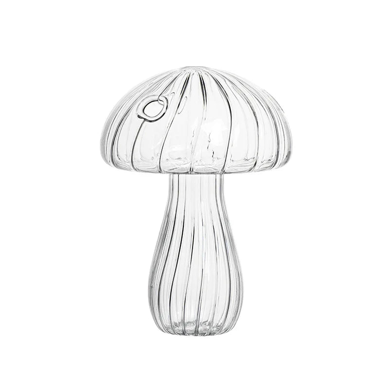 Clear glass vase shaped like a mushroom with ribbed texture