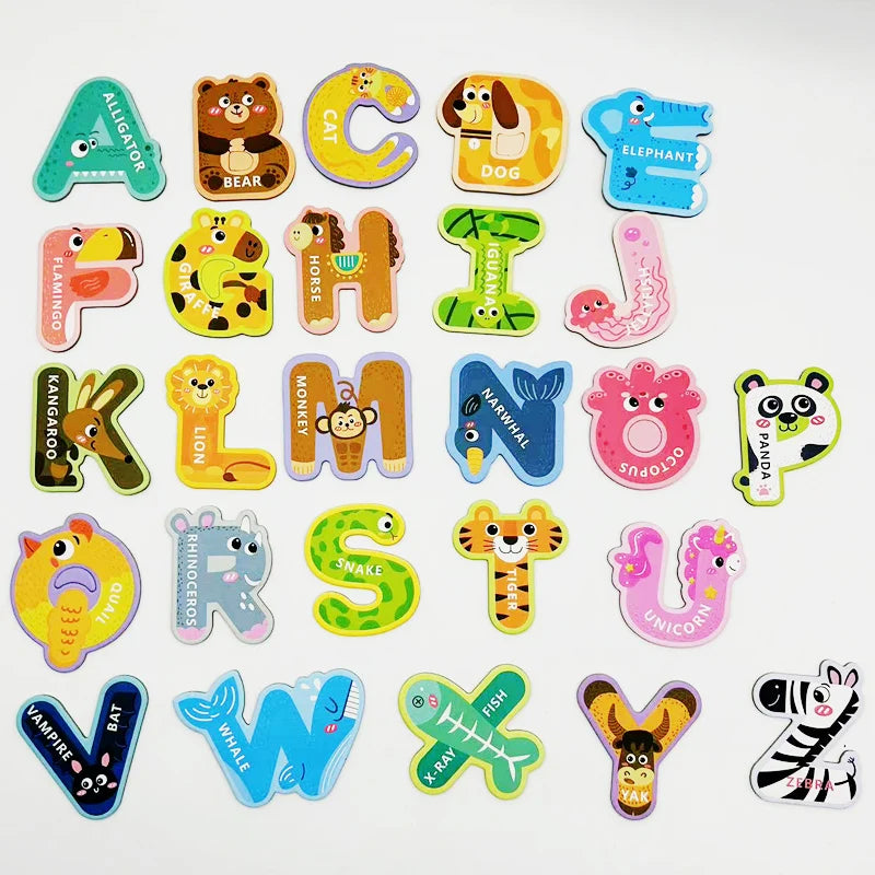 A collection of colorful magnetic alphabet learning magnets including letters, animals, and shapes.