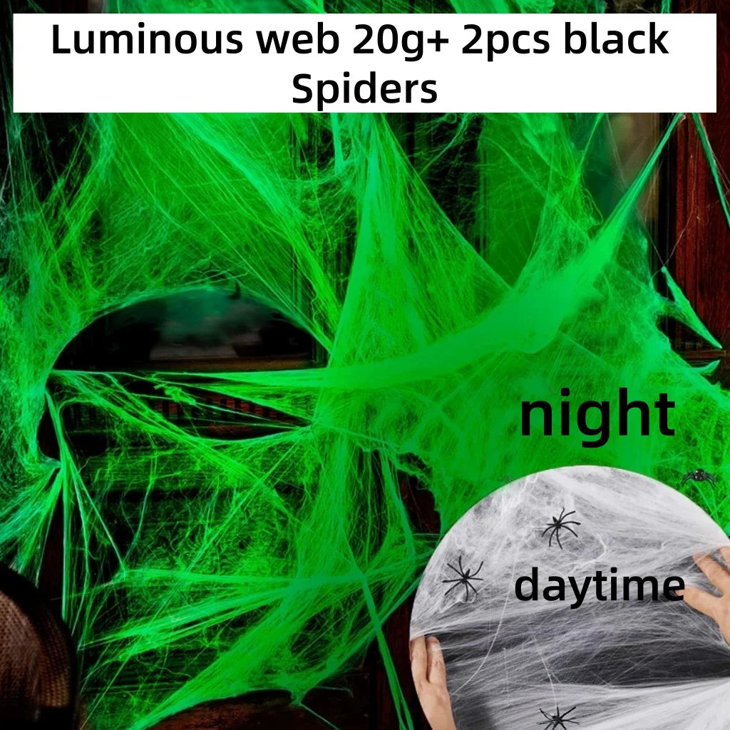 Green luminous spider web and fake spiders used as Halloween decor for night and daytime viewing.