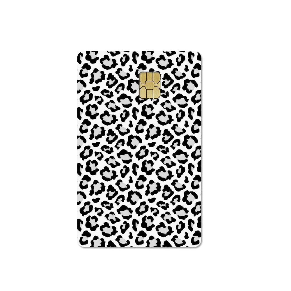 A black and white leopard print card cover featuring a gold embossed card design.