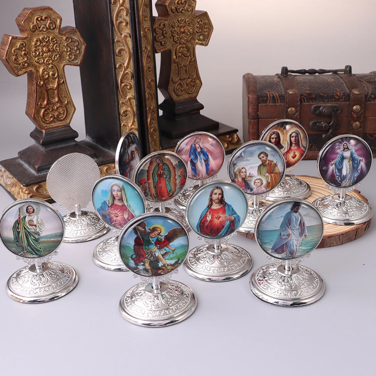 A collection of retro Catholic tabletop ornaments featuring religious figures and crosses.