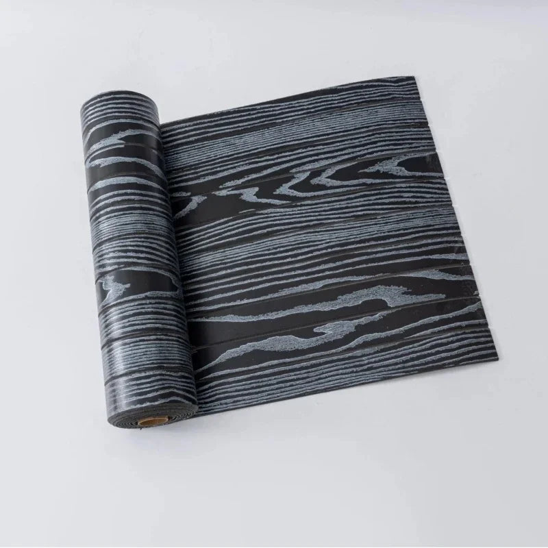 Roll of 3D wood grain self-adhesive wallpaper featuring dark gray and black stripes.