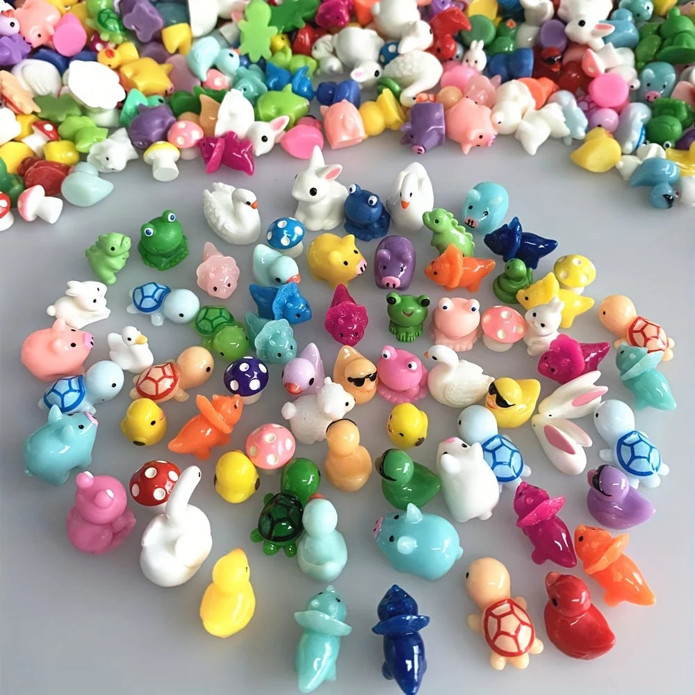 Assorted resin miniature figurines in various colors and shapes for DIY decor