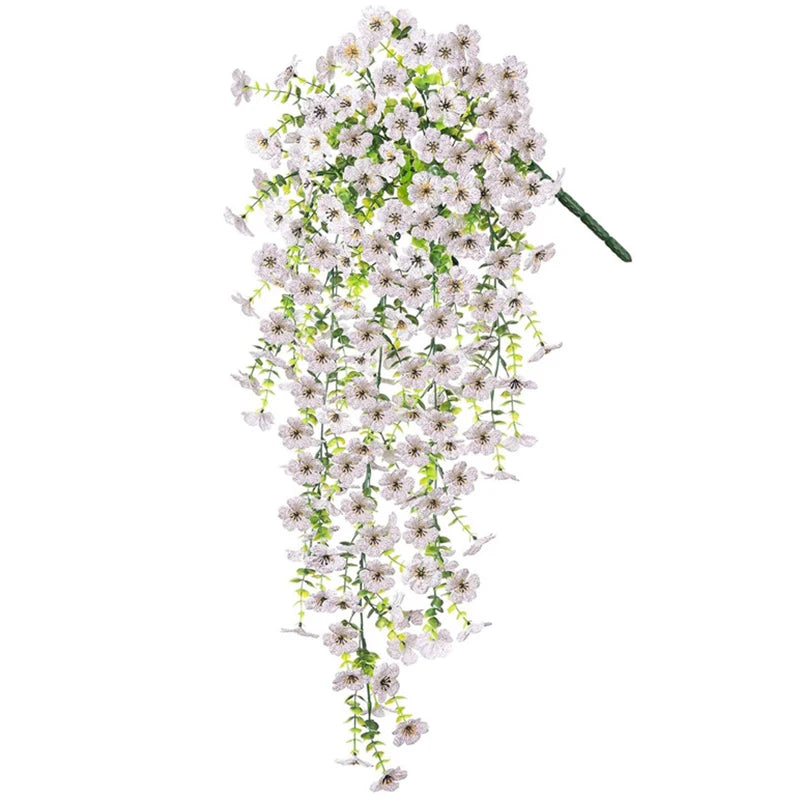 A long, cascading arrangement of white artificial morning glory flowers on a green vine.