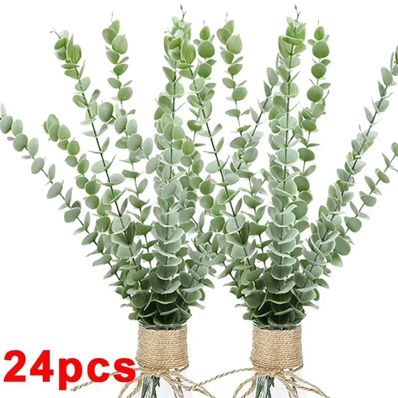 A bundle of artificial eucalyptus stems with green leaves tied together for home decor or wedding centerpieces.