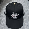 Black embroidered star hip-hop baseball cap with silver detailing and a gold button.
