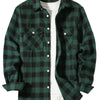 A dark green plaid flannel shirt worn over a white t-shirt.