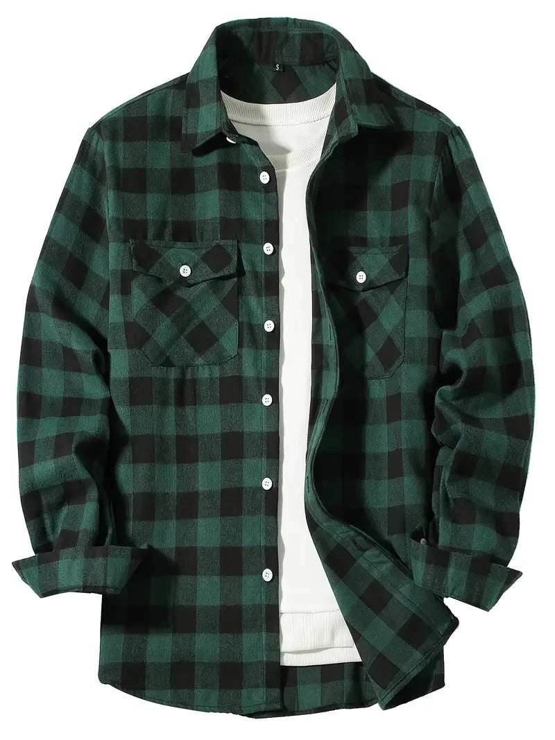 A dark green plaid flannel shirt worn over a white t-shirt.