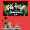 A decorative banner featuring a black and white image of the band Green Day against a dark, leafy background.