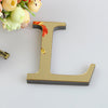 A 3D golden letter L wall decal featuring a textured surface and a subtle gold rim.