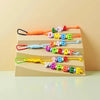 A set of colorful nylon rope craft kits with numbers and letters for DIY keychains and charms.
