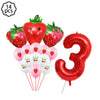 A kit of strawberry-themed party supplies including strawberries, plates, cups, napkins, and a balloon number three.