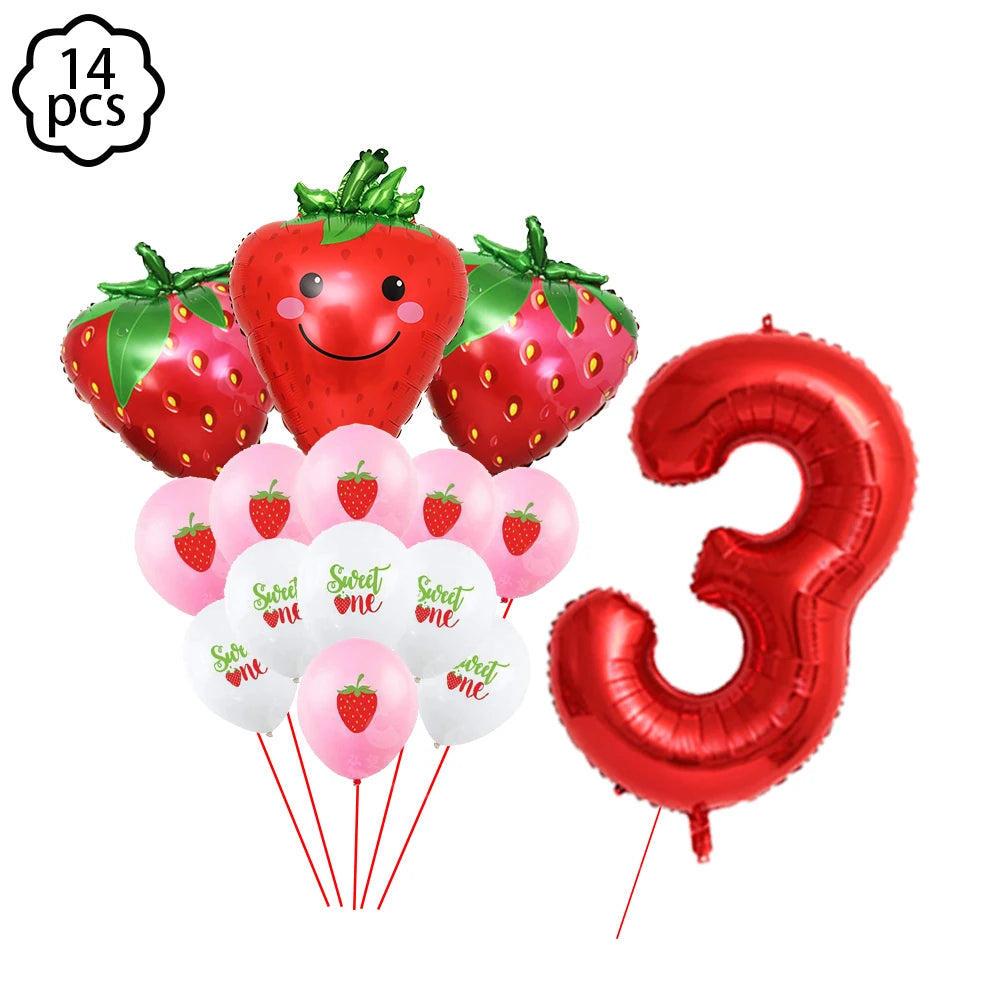 A kit of strawberry-themed party supplies including strawberries, plates, cups, napkins, and a balloon number three.