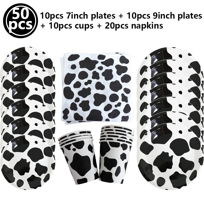 Set of cow print plates, cups, and napkins for a farm-themed party