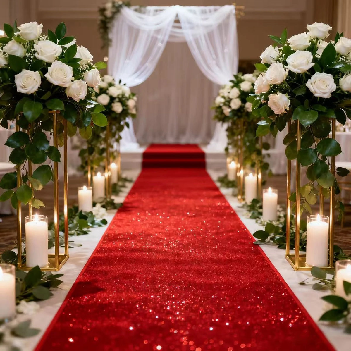 Elegant white sparkling aisle runner with red carpet and floral decorations for a wedding ceremony.