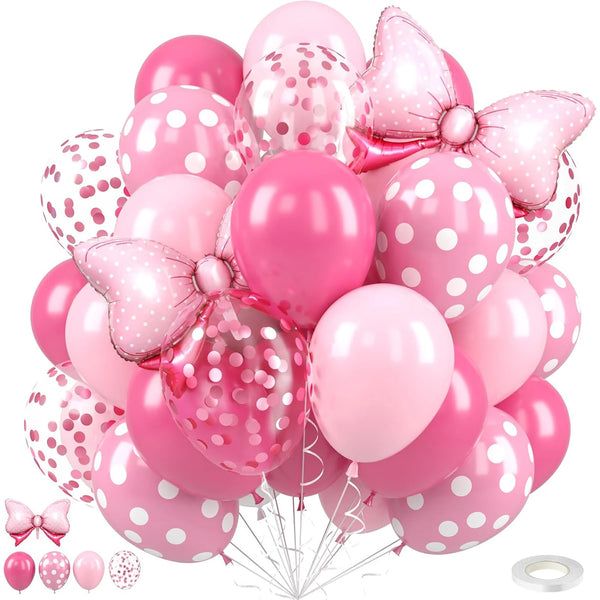 A cluster of pink foil bow balloons in various sizes and shades.