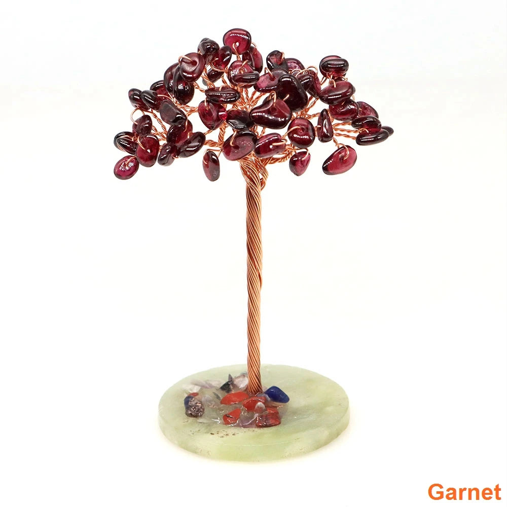 Natural crystal money tree decor featuring deep red beads on a copper wire stem and green base