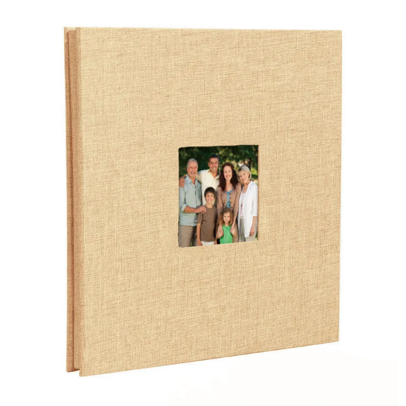 A beige linen front scrapbook memory book with a photo of a family.