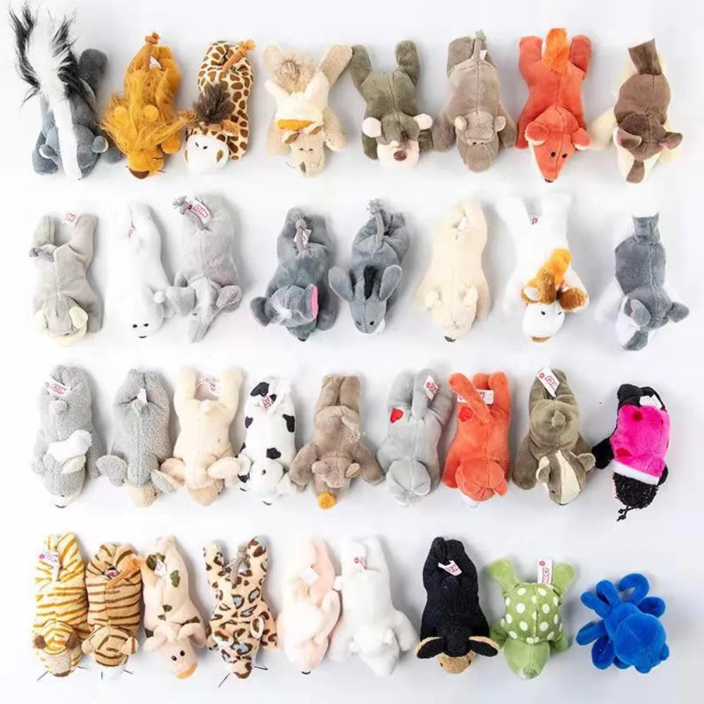 A collection of cute plush animal fridge magnets featuring various animals in different colors and textures.