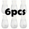 Six clear faceted diamond crystal plastic vases displayed side by side.