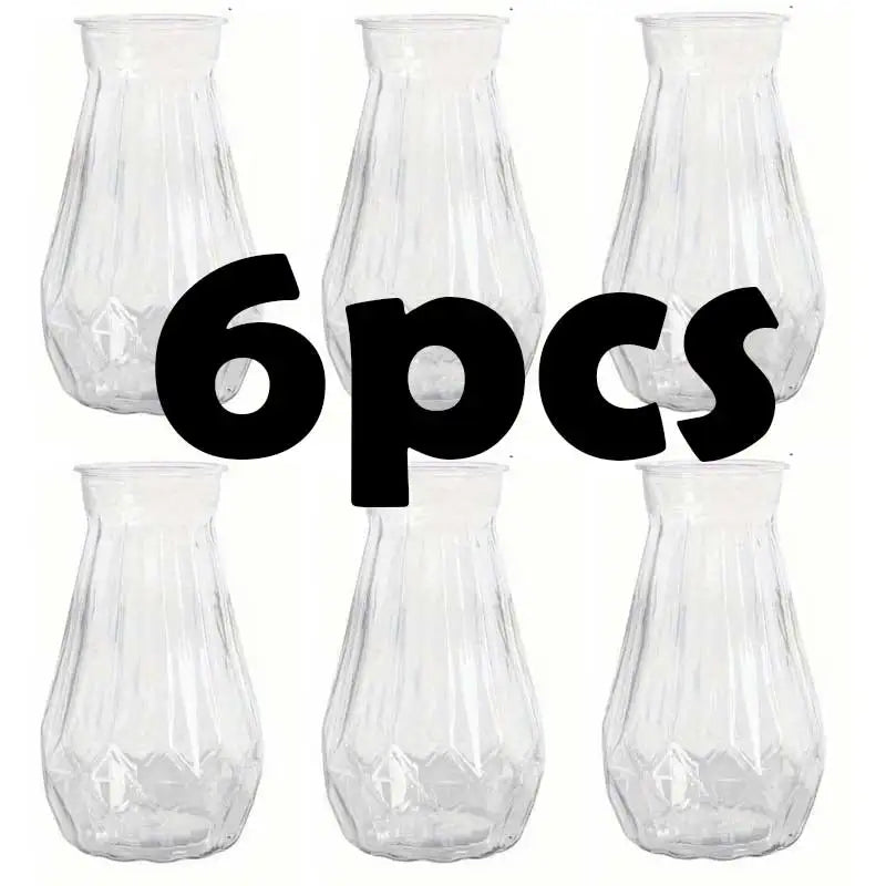 Six clear faceted diamond crystal plastic vases displayed side by side.