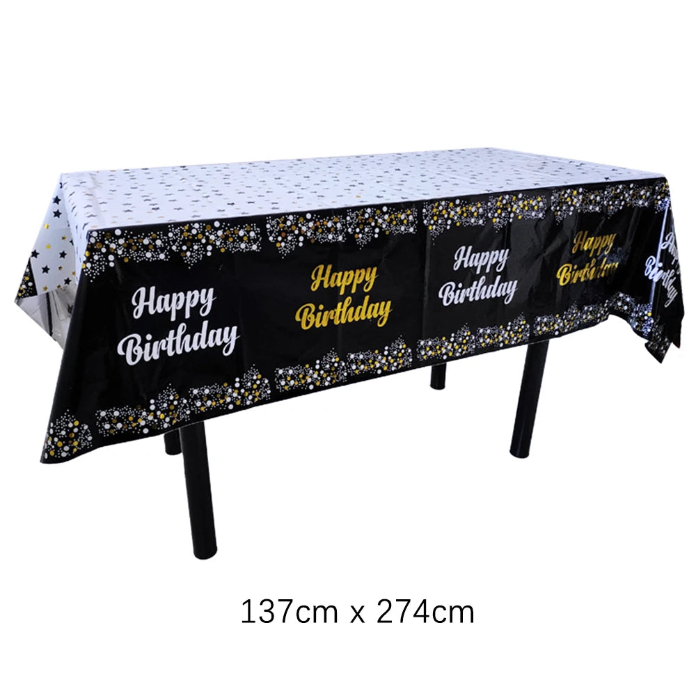Black and gold disposable tablecloth with birthday text for parties