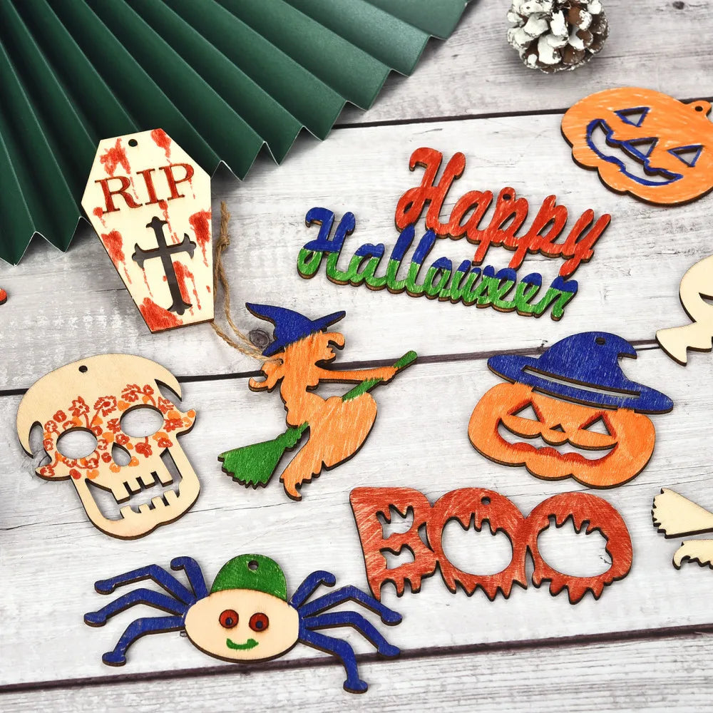 A collection of wooden Halloween ornaments including a skull, pumpkin, and spider, set against a light wooden background.