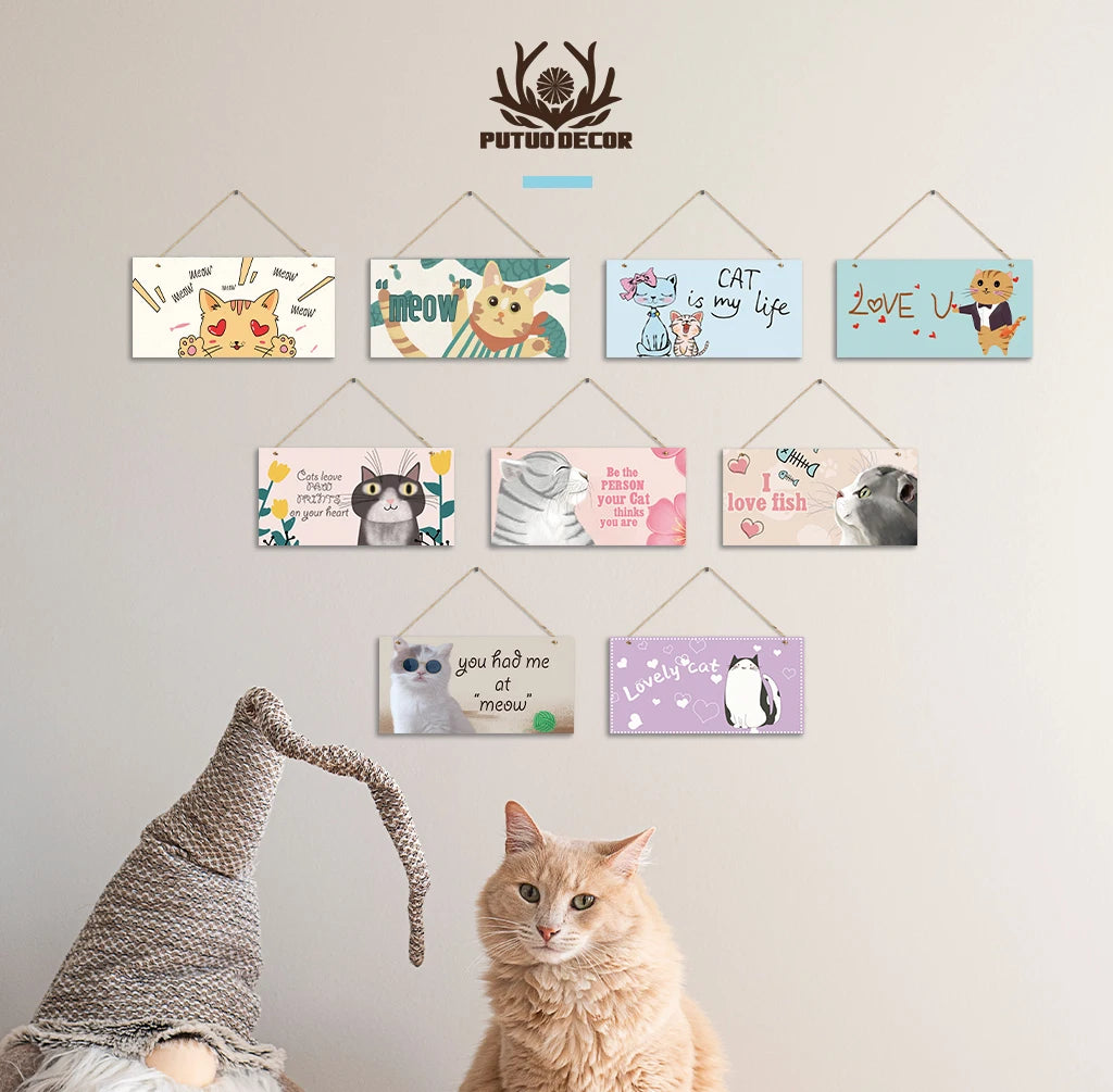A collection of wooden cat wall plaques featuring cats and related phrases like I love you and my life.