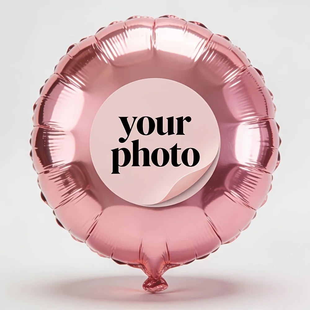 A pink foil balloon shaped like a heart, featuring a circular sticker with the text your photo.