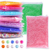 A collection of flatback resin rhinestones in various colors including orange, pink, blue, green, and purple.