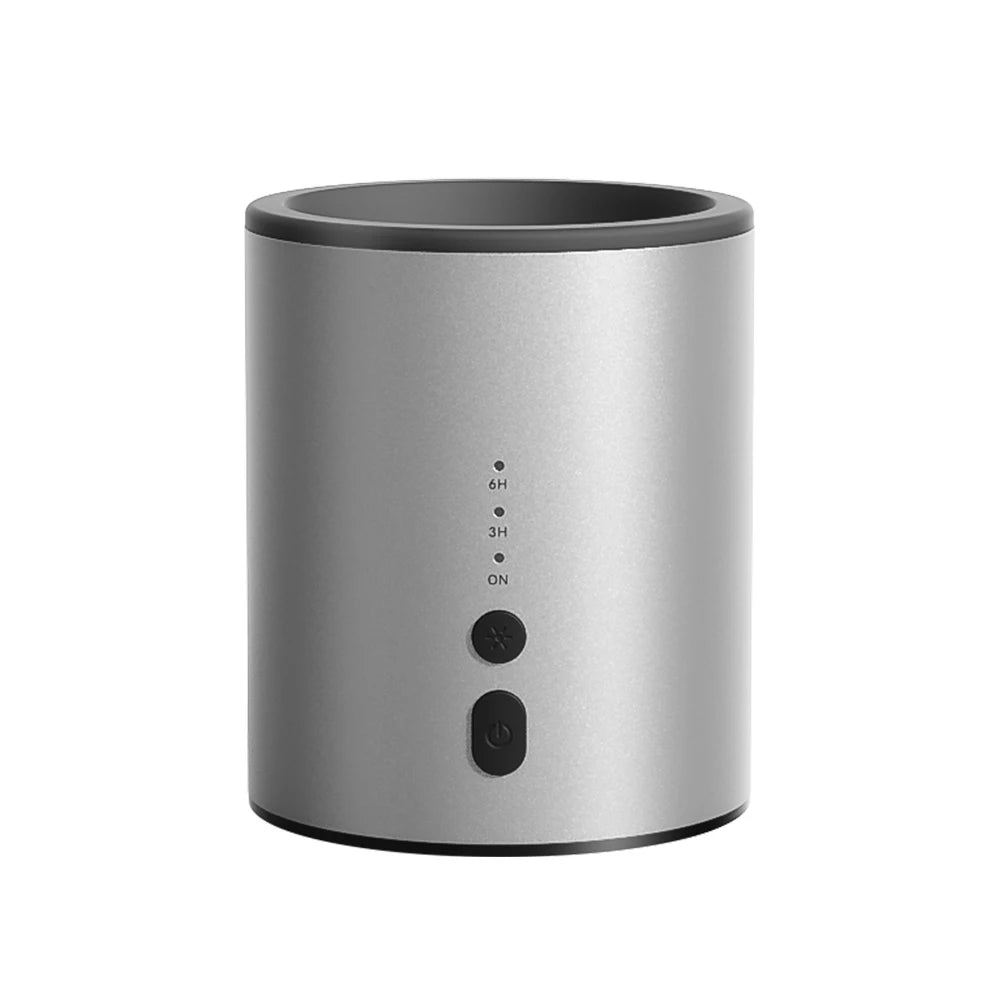 A silver electric candle warmer lamp with a control panel featuring timer settings and an on switch.