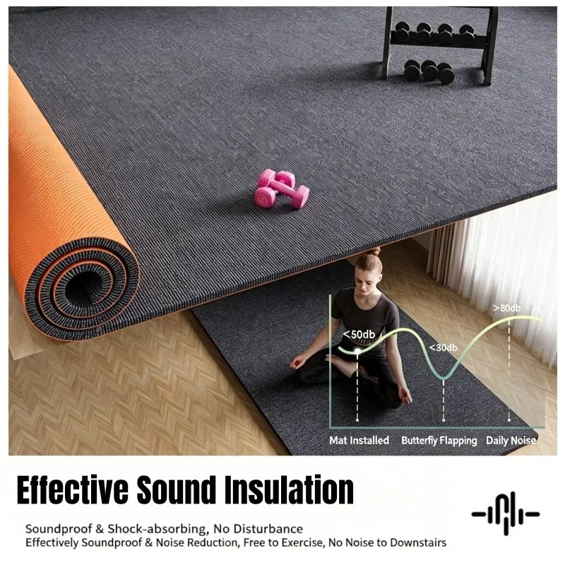 A dark gray artificial grass carpet is shown installed on a wooden floor, demonstrating effective sound insulation.