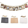 A display featuring a string of rustic wooden clip photo frames with kraft paper inserts.