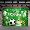 A vibrant green backdrop for a birthday celebration featuring soccer balls, balloons, and a decorated cake.