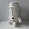 A white soft plush toy shaped like an energy drink can with a dripping sugar design.
