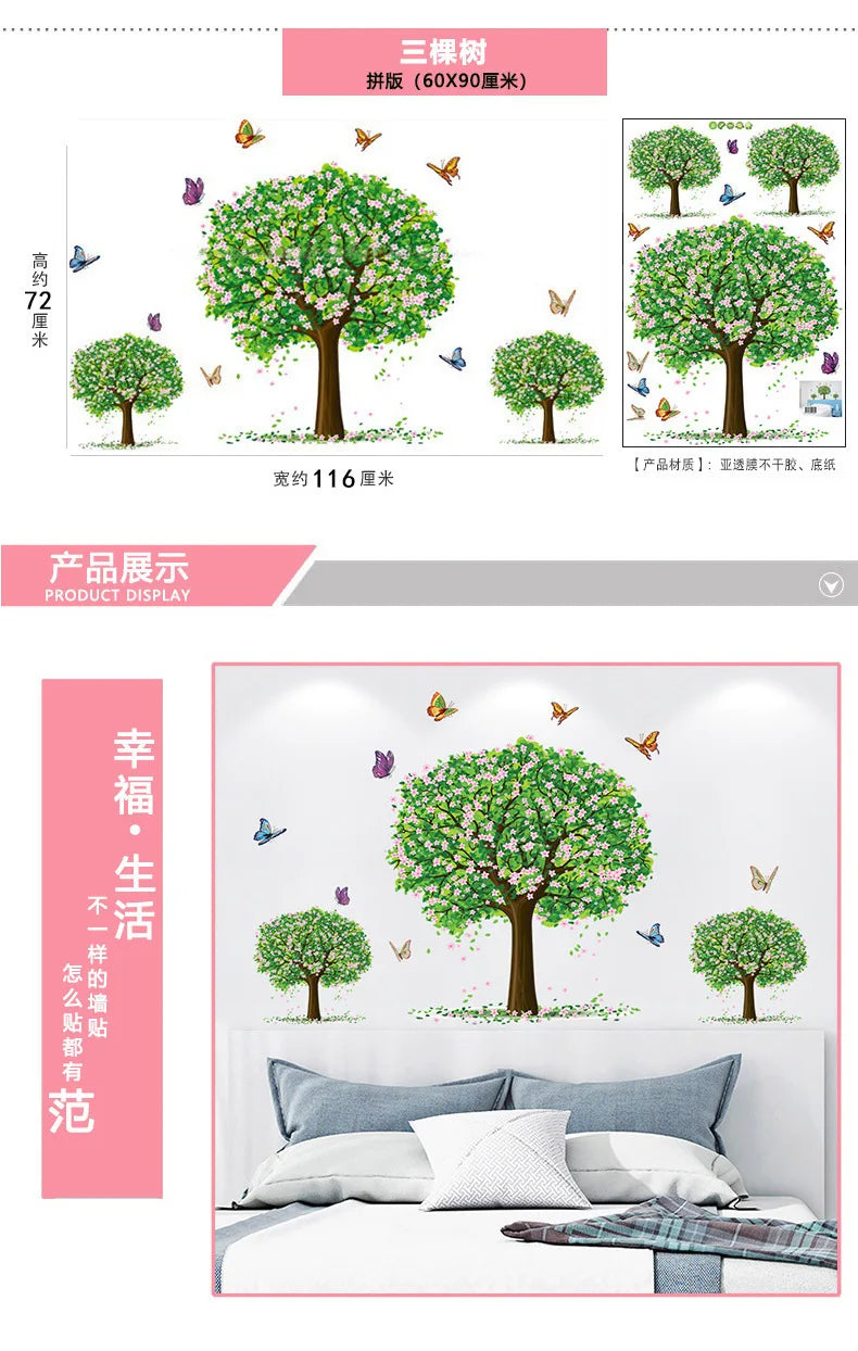 A set of three green tree wall stickers featuring pink blossoms and small birds, displayed in a bedroom setting.